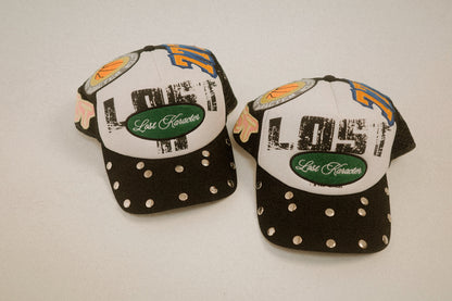 LOST LOGO MULTI PATCH TRUCKER HAT